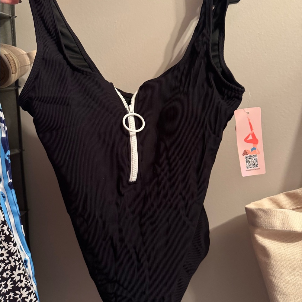 Black Swimsuit with Zipper Detail